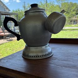 Vintage teapot with strainer