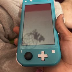 Nintendo Switch Lite With SD CARD