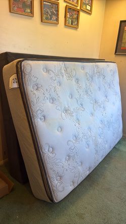 Full size mattress with box springs and metal frame