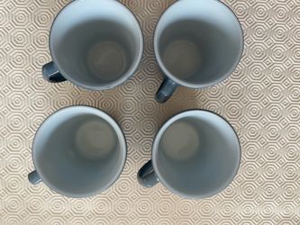 Set a four Pyrex coffee mugs