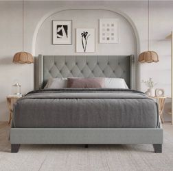King size Gray upholstered bedframe ( no mattress included, box springs available if needed)