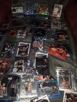 All heavy hitters🏆UFC cards signatures patches rare numbers refractors and more