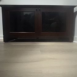 Mahogany Brown Entertainment TV Stand Or Storage Cabinet Swivel Wheels Can Hold A Large Tv Up To 60 Inches Or More Smoke Glass Top & Door From Raymor 