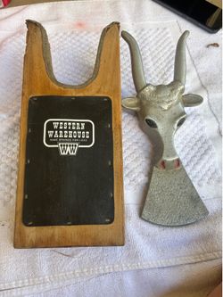 Vintage western warehouse wooden boot jack and cast metal steer head boot jack
