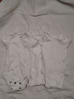 8 white newborn short sleeve onesie's