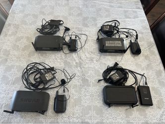 4 SHURE RECIEVERS WITH TRANSMITTERS
