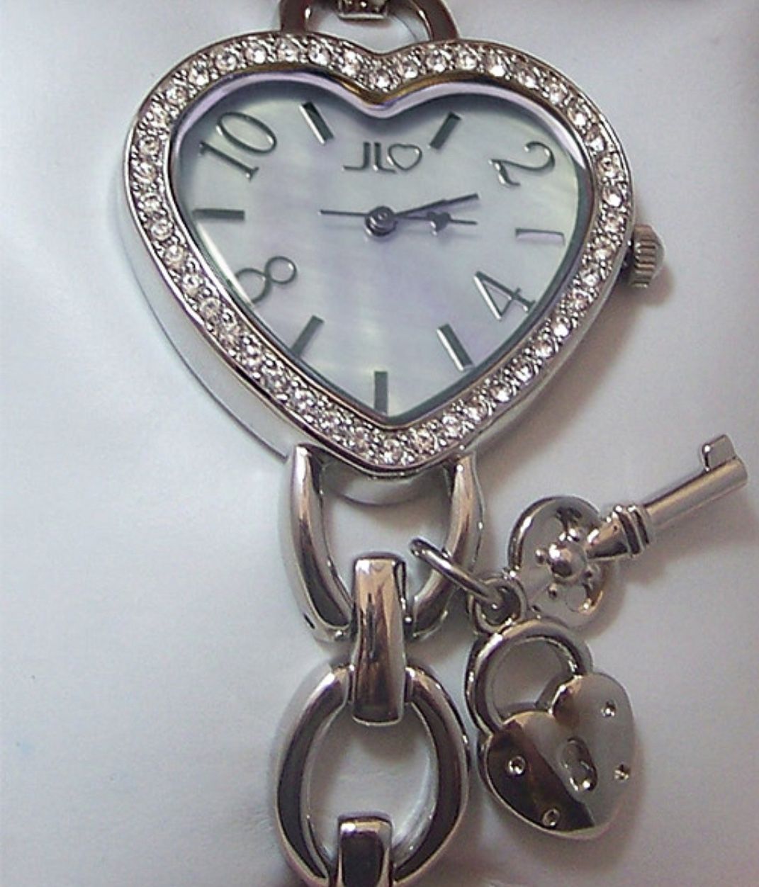 JENNIFER LOPEZ SILVER HEART-SHAPED WATCH WOMENS