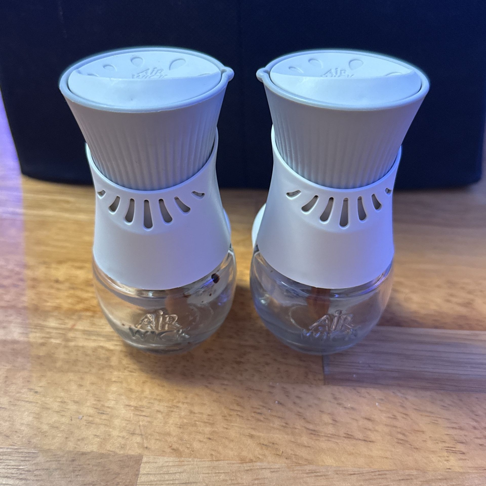 2 Air Wick Plug in Scented Oil Starter Warmers