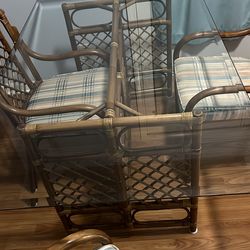 Table- rectangular glass top, wicker table, and chairs