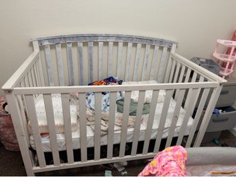 Crib and bedside bassinet