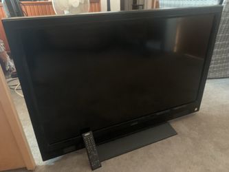 48 “ black Vizio flatscreen w/remote