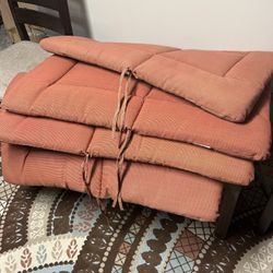 four chair cushions