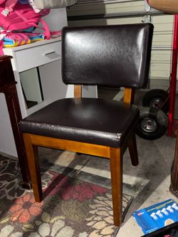 Dark brown faux leather chairs/ 4