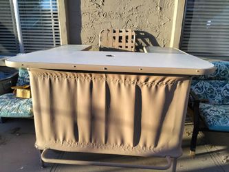 Bar table with one stool and umbrella