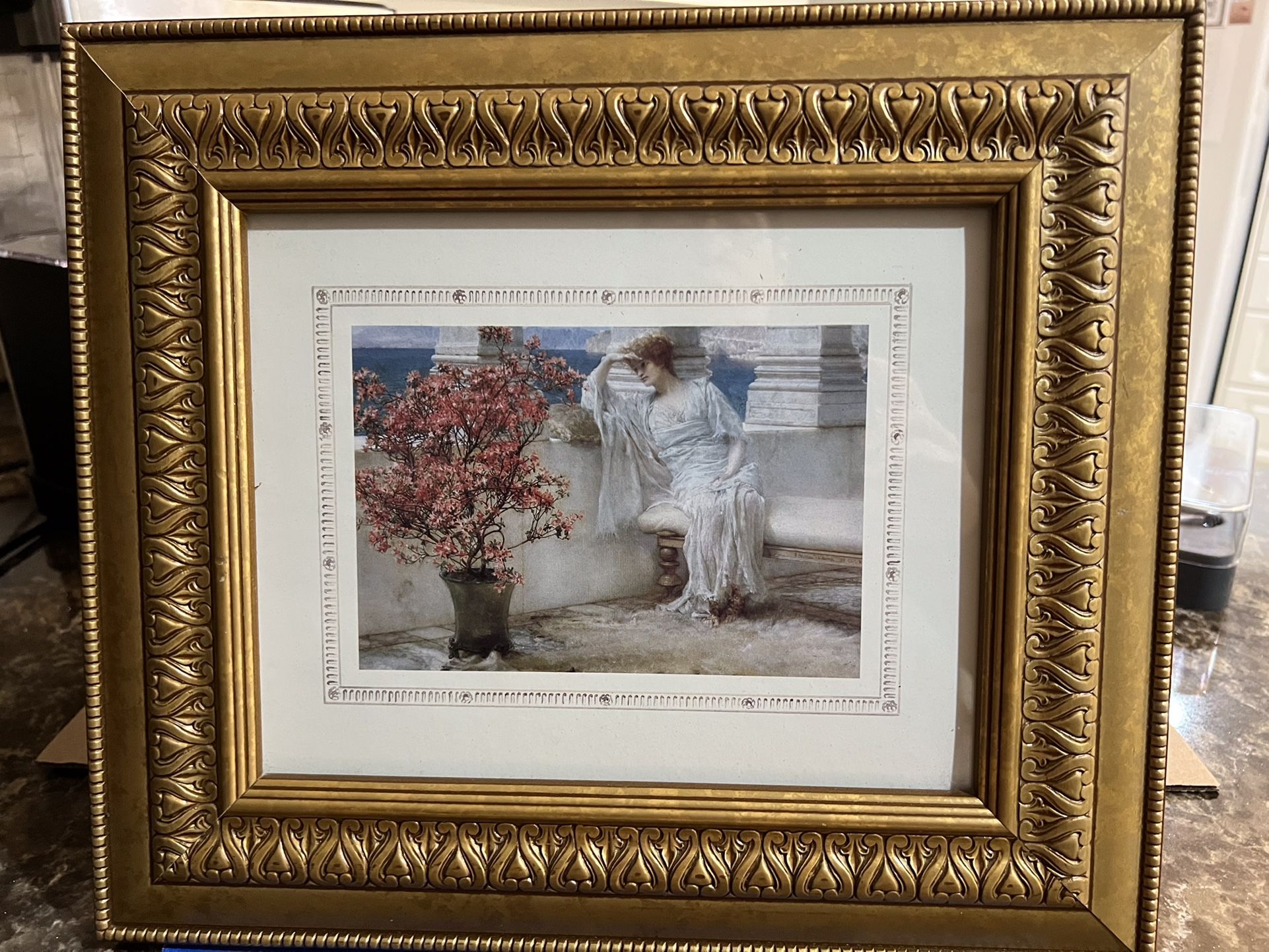 Two Gold Frame Pictures