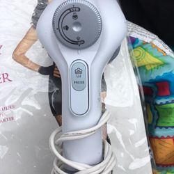 Like new handheld electric clothes steamer only $10 firm