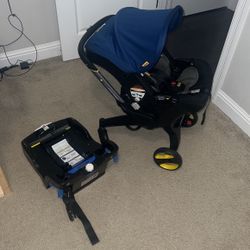 Doona Infant Baby Car Seat Stroller And Base