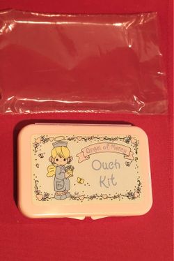1995 vintage Precious Moments "Ouch Kit" first aid container with Original Contents. 3"×4.5"