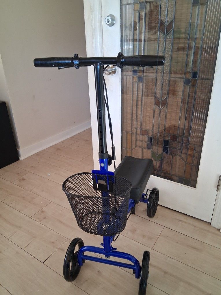 LIKE NEW KNEE SCOOTER.  ...GREAT CONDIRION ....BLUE