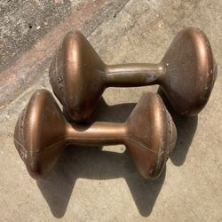 Vintage plastic Superstar dumbbells filled with a mixture of sand and concrete.