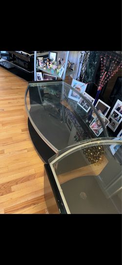 Three glass tables
