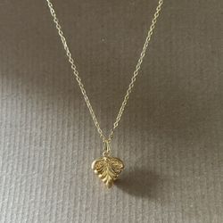 Gold color long necklace with pendant