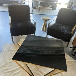 2 Chairs, 1 Coffee Table. 2 Sofa’s And One Chair.