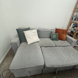 Sectional pull out couch with storage