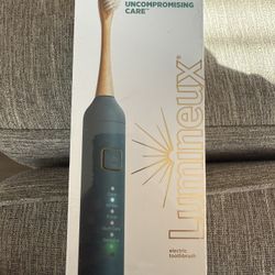Luminex Electric Toothbrush Brand New!