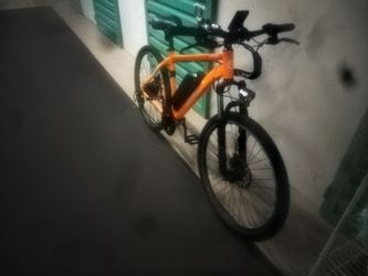 Orange Electric Bike with Battery Pack