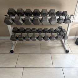Dumbbells weights 20-65lbs plus rack of 730lbs total