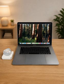 15 inch Apple MacBook Pro laptop computer with Touch Bar ID clean LOOK