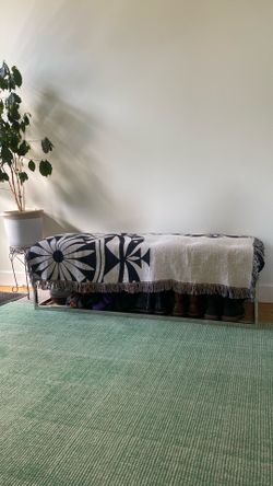 Two Black tufted vegan leather benches