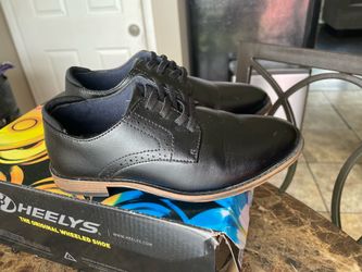 Boys dress shoes size 1Medium. Only worn once.