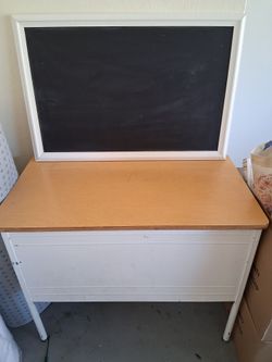 Desk and chalkboard