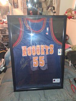 1994 Champion "with original tags" Denver Nuggets Mutumbo Autographed Jersey