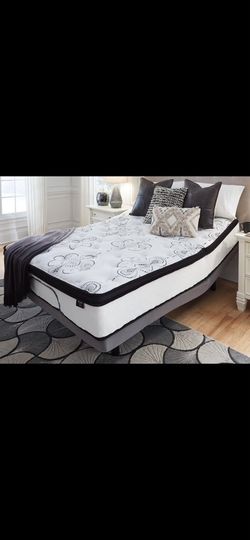Bed, frame, sheets, and pillows