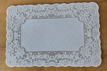 6 placemats, white plastic, lace design.