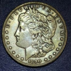 1890 “CC” AU Morgan Silver Dollar With Toning 