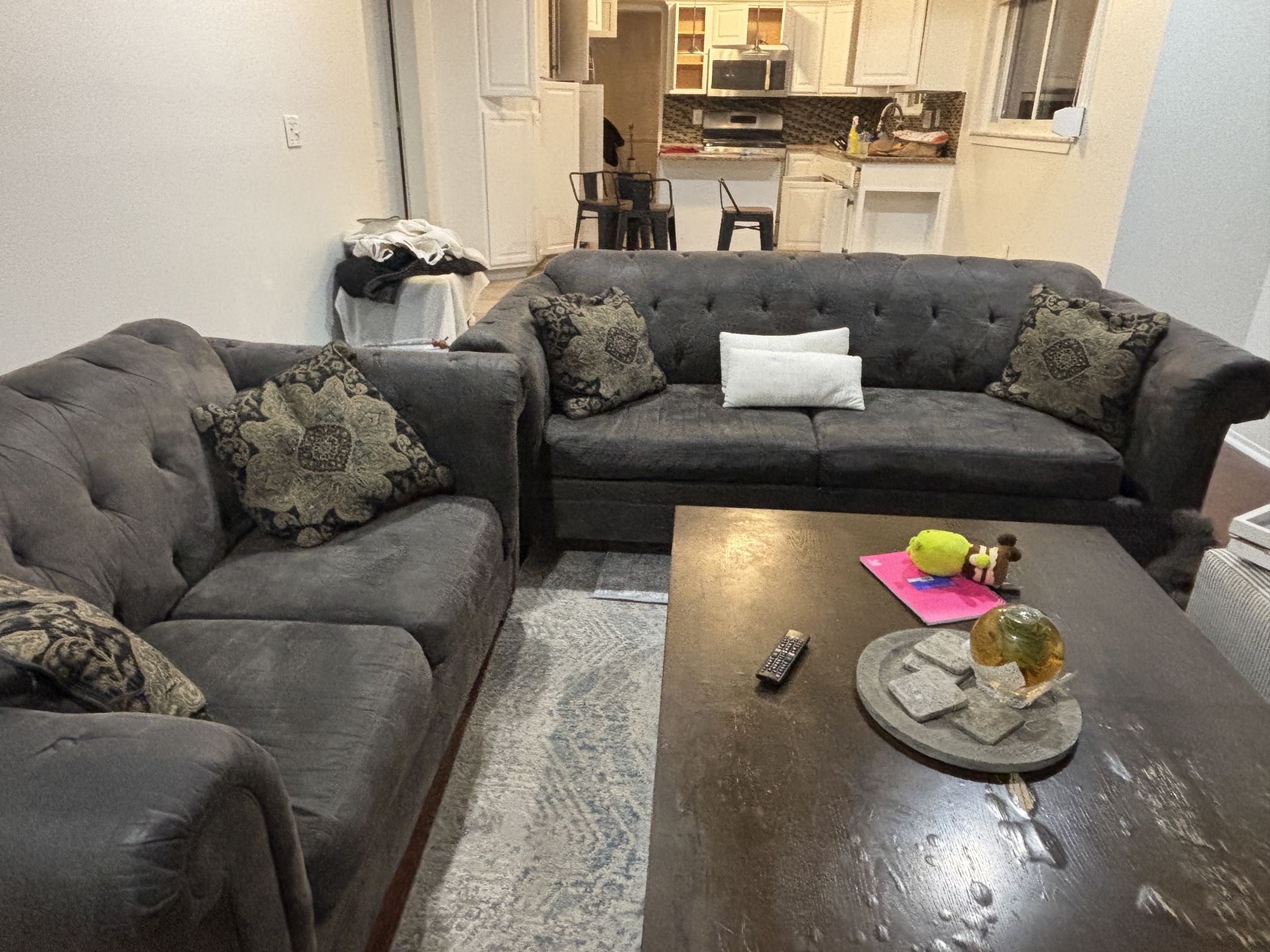 Gray tufted Ashley-style sofa set — gently used, still comfortable, Comes with pillows And Table If You Wants .