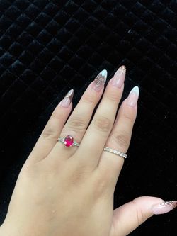 10K Gold Red Oval Gemstone Ring with Sparkling Side Stones