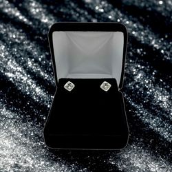 14kt 2.40g White Gold with Cushion Cut Clear Stone with Small Diamonds Earrings.
