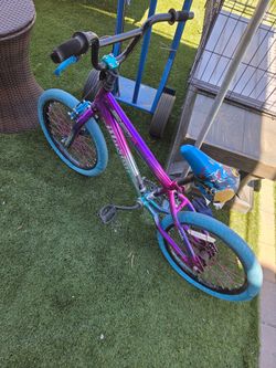 Genesis 18" Illusion Girl's Bike with a vibrant purple and blue chrome finish