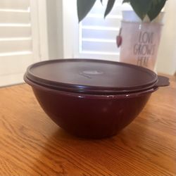 $15 - New Tupperware Wonderlier starlight bowl with lid.  Color is Merlot with sparkle. Holds 10 cups.  Please pickup in the area of 36th Ave and Pinn