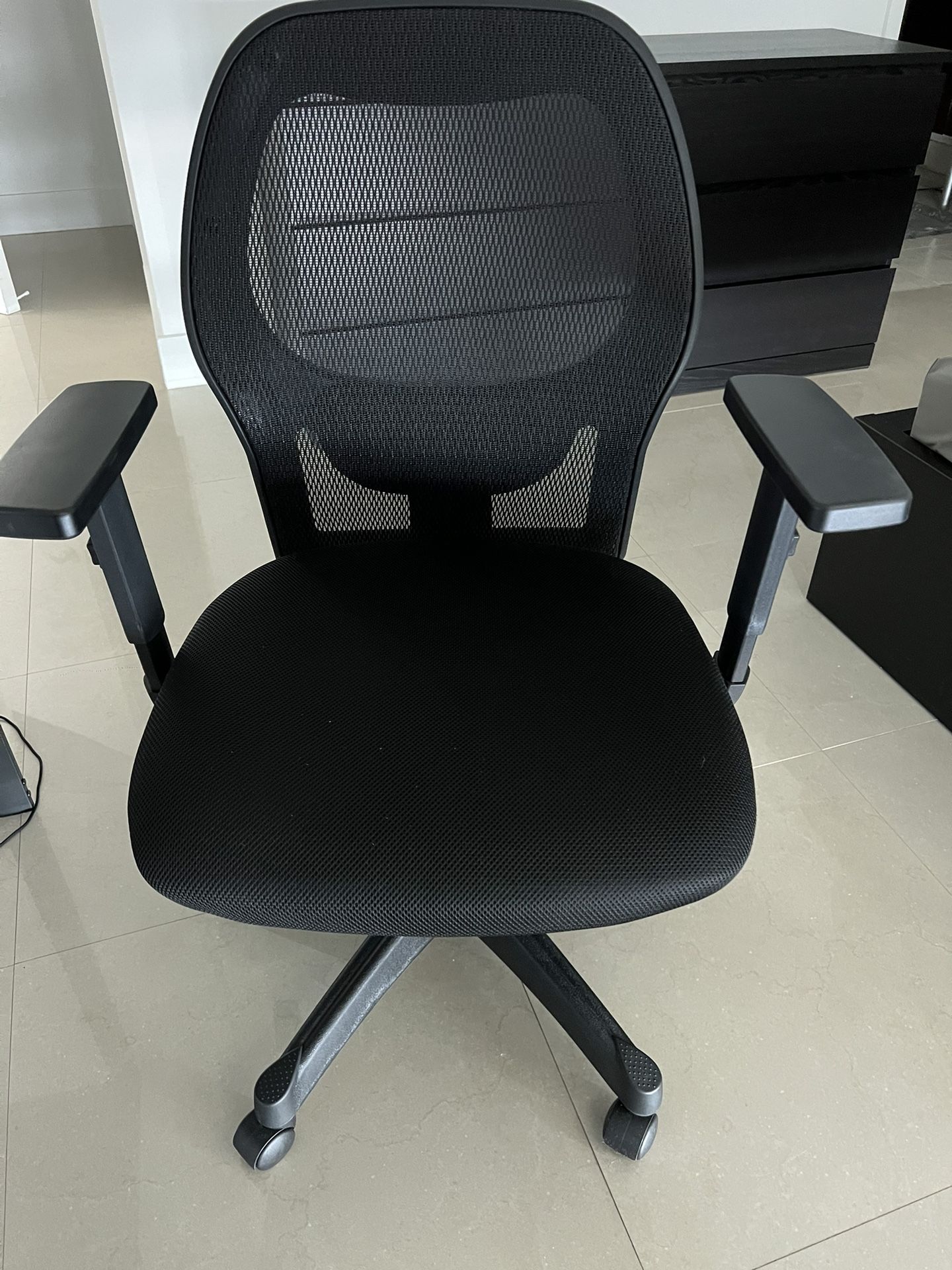 Black, adjustable office chair
