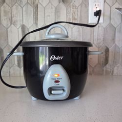 ​Oster 6-Cup Electric Rice Cooker Pot with Glass Lid - Black