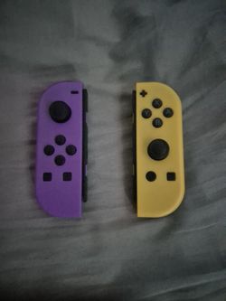 Nintendo Switch Joy cons Purple and Yellow (Light Up)