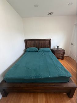 Wooden bed frame with nightstand