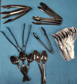 Unused black serving utensils