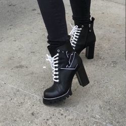 LOUIS VUITTON LEATHER STAR TRAIL ANKLE BOOTS